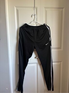 Nike Women' Black Track Pants with White Stripe